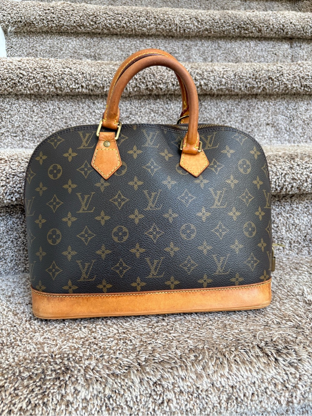 Louis Vuitton Women’s Brown Monogram Alma PM Satchel with Tan Trim